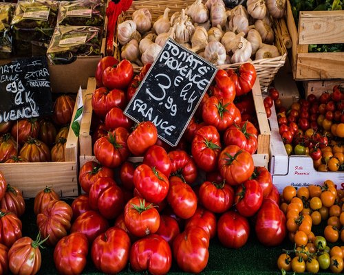 Traditional Indonesian market context displaying rich arrays of fresh local vegetables and fruits